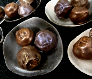 Precious Pearls on Pottery Shells