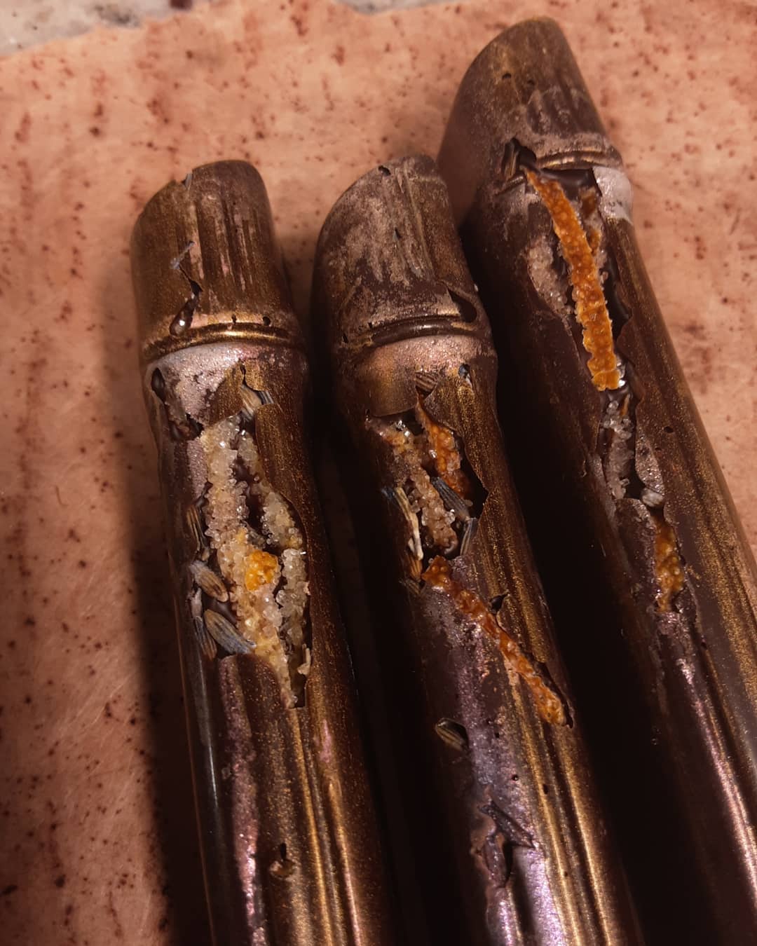 CRISP AND LAVENDER: Brown sugar caramel with lavender and blood orange curls in a fudgy dark chocolate shell#chocolatier #cloudcaramel #lavender #contrastin contrast, gentle comforts scattered among broken edges. in contrast, soft texture gives way under crisp layers. in contrast, vibrant brightness against subtleties