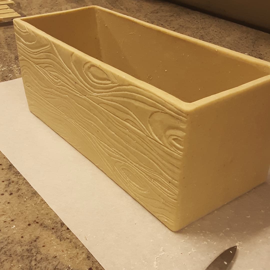 Working on a special commission project that will be packed in this spiced white chocolate "wood" crate before being shipped. Projects like this keep us on our toes.#chocolatier #chocolateasart