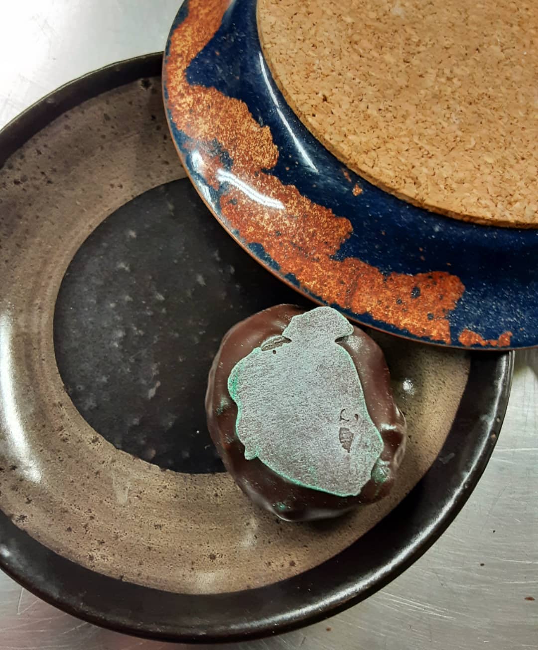 SOMEONE ELSE'S NORMAL: housemade Ghana dark and olive oil ganache enrobed in Peruvian dark chocolate.#chocolatier #oliveoil #chocolatetrufflesMaybe sometimes perhaps, it happens to be normal, in an elsewhere sort of place.