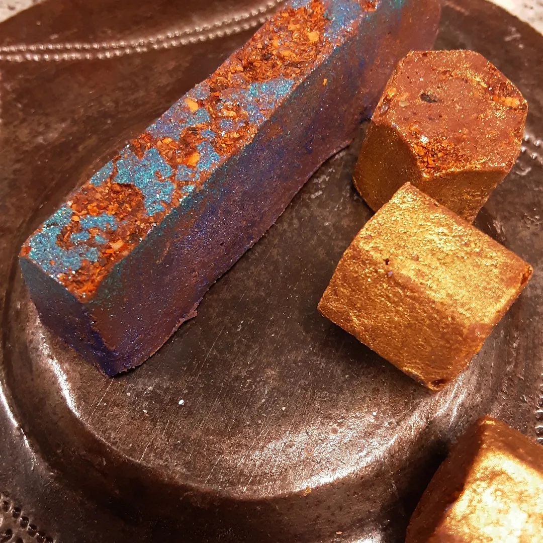 THE ROLE OF VIBRANCE: walnut, peanut, and cashew praliné with dark chocolate and a blend of chiles.#chocolatier #nottoospicy #praliné #colorVibrance plays its part, in art or life or color. Picking up the little pieces, puzzling them together. Colors flashing through the memory, moments as they are, will be remembered. Vibrant life experienced through own choice and chosen colors.