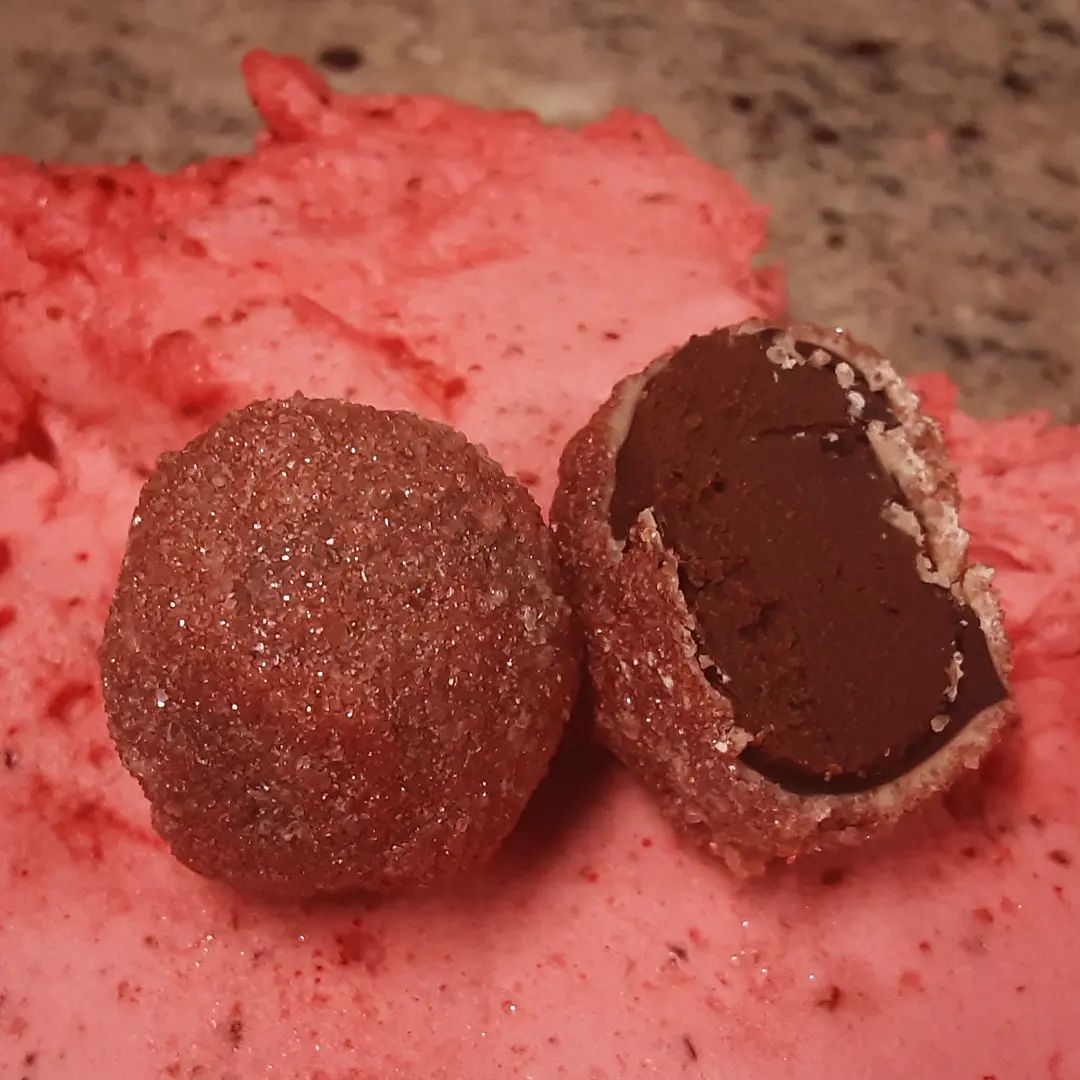 DESIRE LIVES IN THE HEART - Quebec red peppercorns with ginger, vanilla, and thress chocolates cast in layered Mexico dark and Tanzanian white.#chocolatier #chocolatetrufflesWe pretend We thinkWe knowDesire butDesire livesIn the heartOur thoughts Only Reflections.