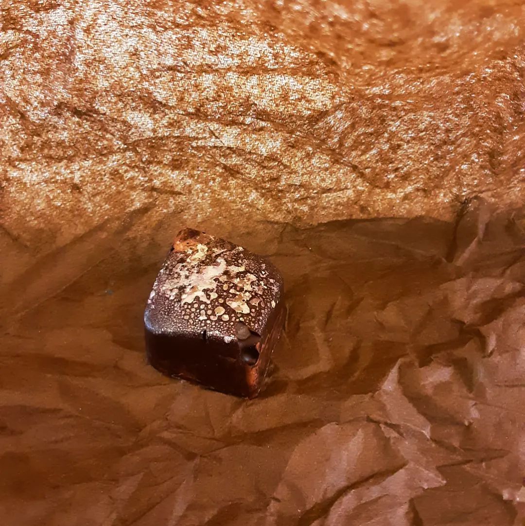 ITS A SQUASH BONBON: fresh sage and local summer squash ganache in an Ecuador dark chocolate shell.#chocolatier #vegetables #summersquashDinner and dessert? All in one for fewer choices.