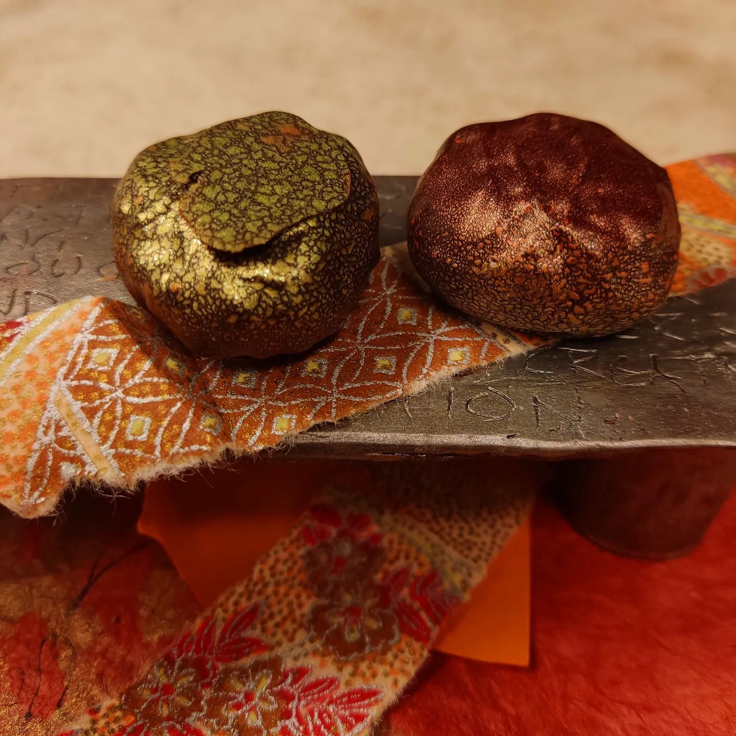 TWO TONE - peaches and star anise with house white finished in Ecuador dark. #chocolatier @hacienda_victoria_ecu #chocolatetruffles A mite quiet in our kitchen of late. Not much debate: a calm spate (you might state). Orange and green; whatever do you mean?